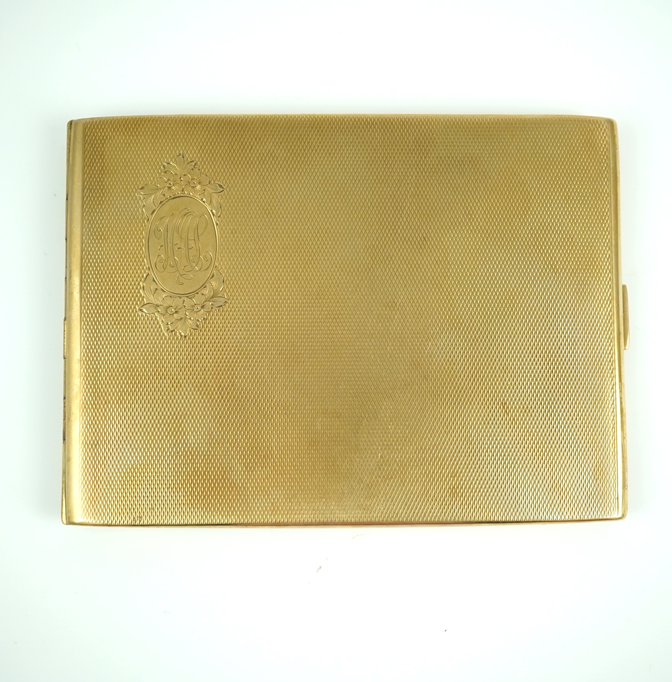 A 9ct gold cigarette case, circa 1929